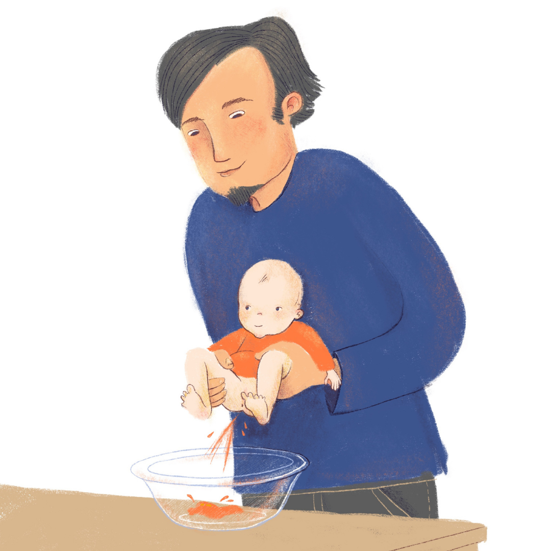 Vater hält Baby über Schüssel ab